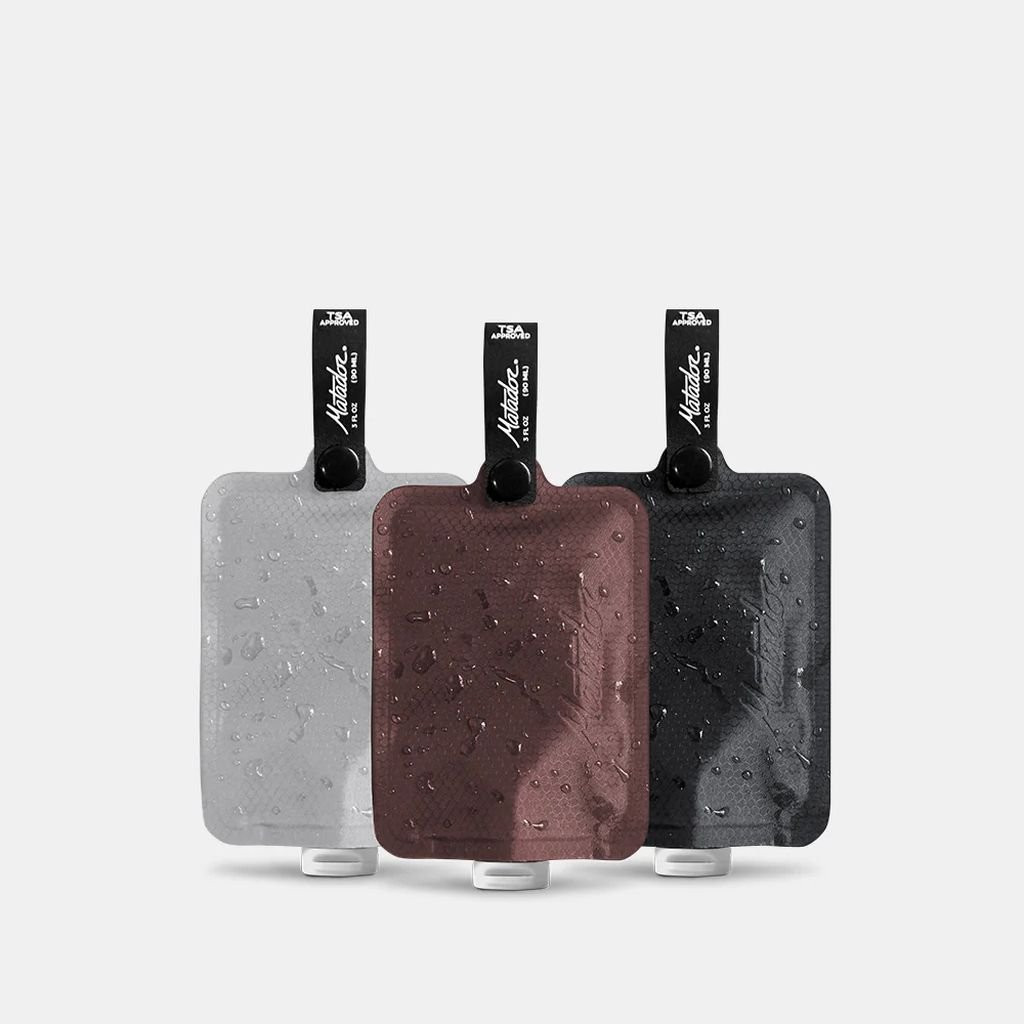 Packs de 3 bouteilles souples Matador Flatpak Toiletry Bottle 3-Pack - charcoal/white/garnet